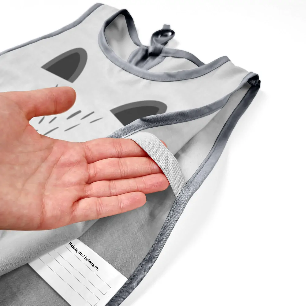 Bavlněná dětská zástěrka s medvídkem mývalem