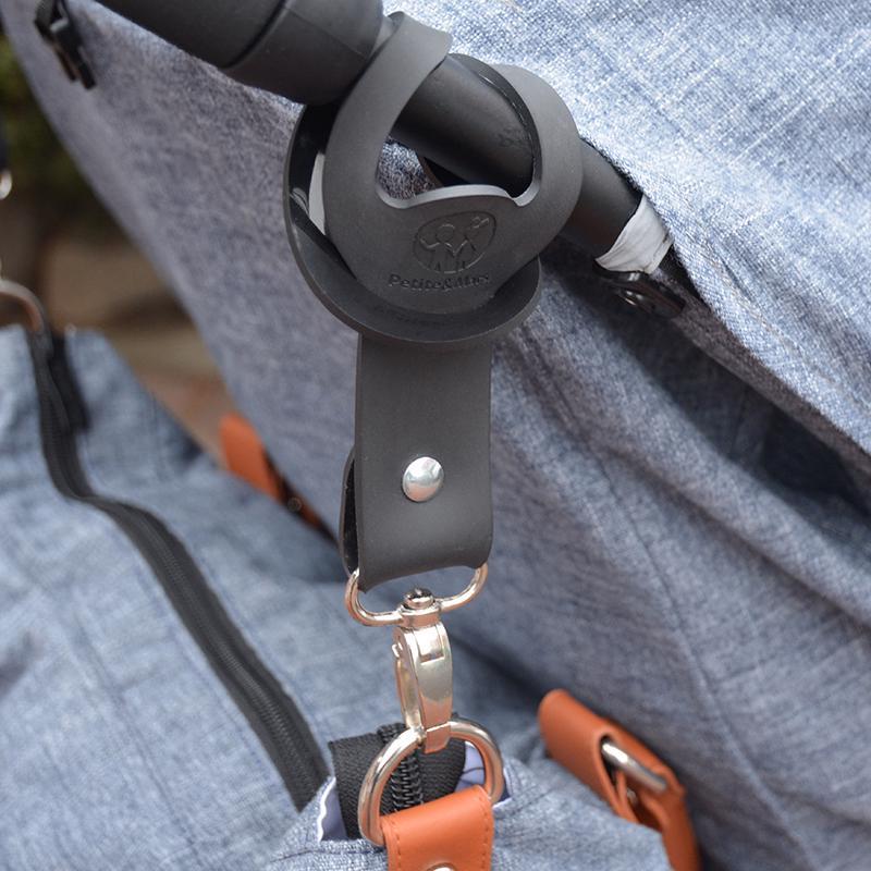 Úchyty Hang k zavěšení tašky na kočár 2ks Petite&Mars sil.